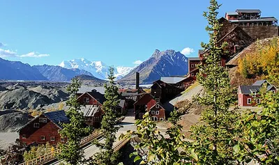 The Kennecott mill town buildings below Bonanza Ridge, the seasonal hub where McCarthy and Kennicott eateries operate in summer.