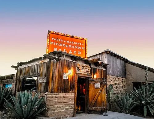Exterior of Pappy and Harriet's Pioneertown Palace, a Tex-Mex BBQ and live-music venue in Pioneertown.