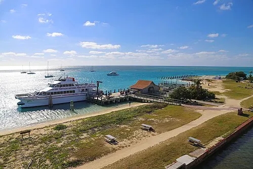 Garden Key seen from the water (substitute image; the Key West waterfront and Mallory Square are the embarkation-town attraction).