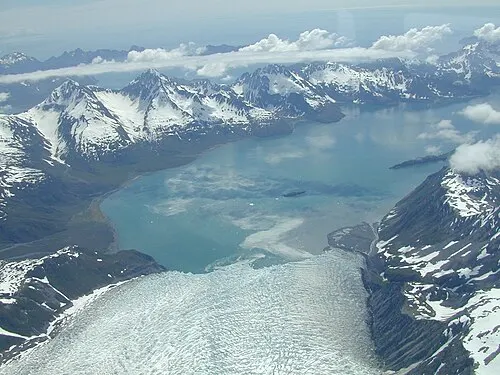 Aerial view of Aialik Glacier, a tidewater glacier ending in Aialik Bay.