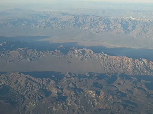 Salt-flat polygons of Badwater Basin stretching to Telescope Peak across Death Valley.