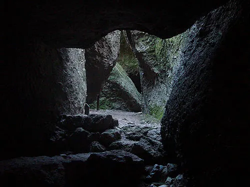Boulders wedged in a narrow gorge form the talus passage of Bear Gulch Cave at Pinnacles National Park.