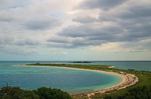 Low sandy Bush Key with scrub vegetation, the seasonal sooty tern and brown noddy nesting island in Dry Tortugas National Park.
