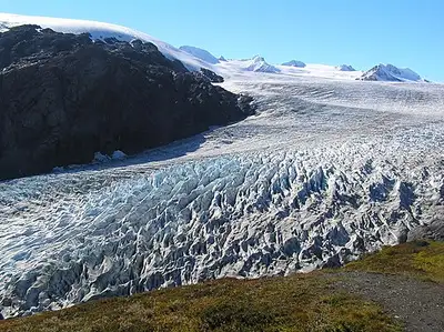Exit Glacier flowing down a valley off the Harding Icefield near Seward, Alaska.
