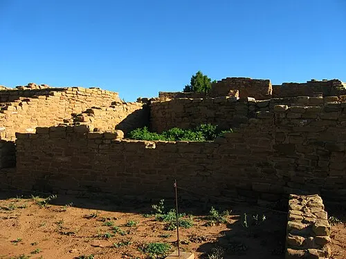 Far View House, a mesa-top surface pueblo with low stone walls laid out across open ground in the Far View Sites complex.
