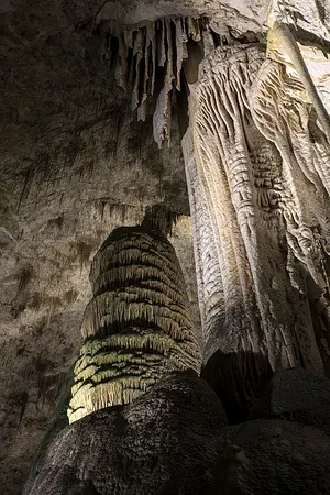 The Giant Dome, a column formation taller than a house, lit on the Big Room trail at Carlsbad Caverns.