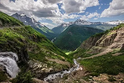 Going-to-the-Sun Road switchbacking up a steep mountain wall in Glacier National Park.