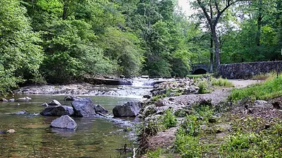Gulpha Creek running over rocks through forest on the east side of Hot Springs National Park.