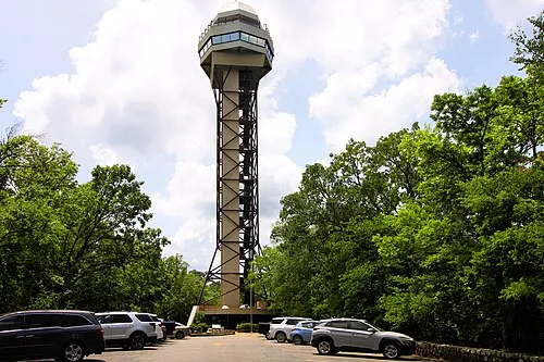 The steel observation tower on the wooded summit of Hot Springs Mountain.