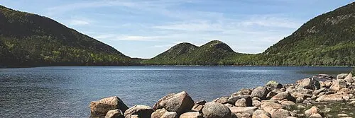 Jordan Pond with the two rounded granite domes called the Bubbles framed at its north end, Acadia National Park.