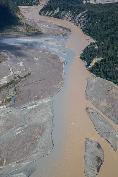 The braided confluence of the Kennicott and Nizina rivers draining the debris-covered Kennicott Glacier below the Wrangell Mountains.