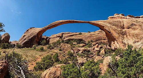Landscape Arch, a long thin ribbon of sandstone spanning 306 feet, the longest natural arch in North America.
