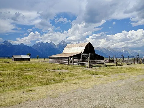The T. A. Moulton barn on Mormon Row standing on Antelope Flats with the Teton Range behind it.