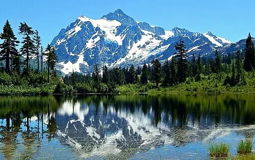 Glacier-covered 9,131-foot Mount Shuksan reflected in Picture Lake near the North Cascades.