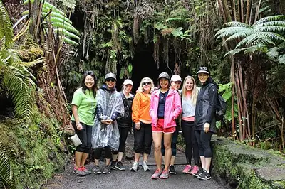 Interior of Nāhuku (Thurston Lava Tube), a walk-through lava tube lined with rock.