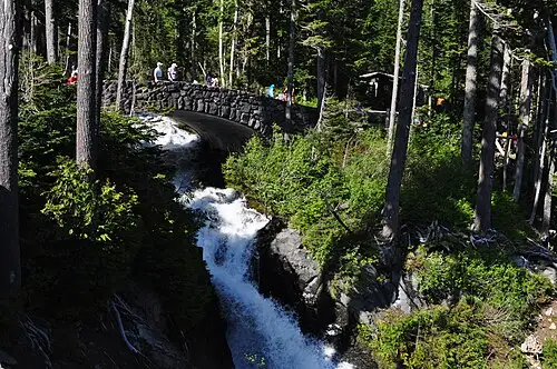Narada Falls dropping in tiers on the Paradise River beside the Paradise-Longmire road.
