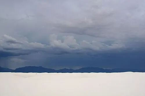The San Andres Mountains forming the western wall of the Tularosa Basin behind the White Sands dunes.