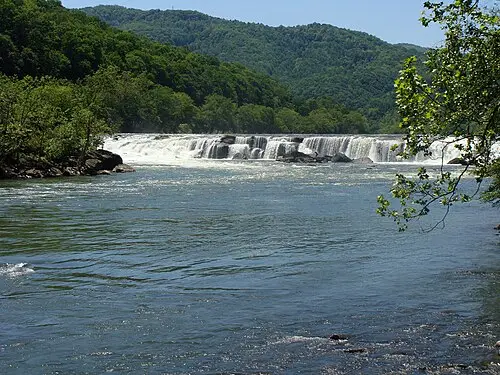 Sandstone Falls breaking across the full width of the New River, seen from the boardwalk overlook.