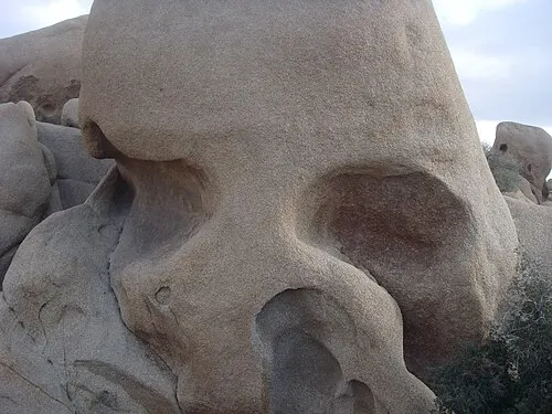 Skull Rock along Park Boulevard, a granite formation eroded into two deep hollows that read as eye sockets.