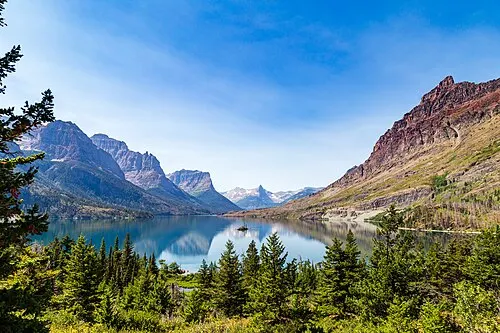 Wild Goose Island, a small island on St. Mary Lake framed by east-side mountains.