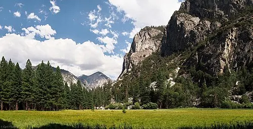 Zumwalt Meadow on the floor of Cedar Grove, a green river-bottom meadow ringed by granite walls in Kings Canyon.