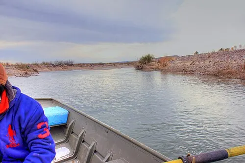 A rowboat ferrying visitors across the Rio Grande at the Boquillas Crossing Port of Entry into Mexico, Big Bend National Park.