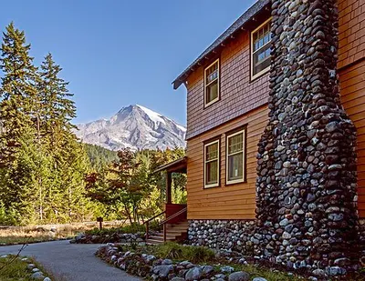National Park Inn in the Longmire Historic District with Mount Rainier behind it.