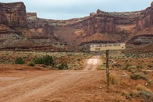 Canyon country below the Island in the Sky rim near Moab, the gateway town for both the Island and the Needles districts (substitute landscape; Moab town shots are sparse on Commons).
