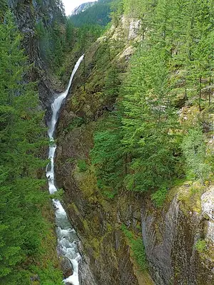 Gorge Creek Falls dropping into its gorge beside State Route 20 near Newhalem (substitute image for the Newhalem and Ladder Creek Falls entry).