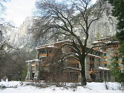 The granite and timber facade of The Ahwahnee hotel, a 1927 National Historic Landmark, below the Royal Arches.