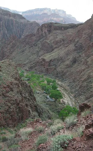 Stone-and-wood cabins at Phantom Ranch on the canyon floor near the Colorado River.