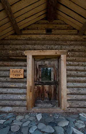 A small public-use cabin in Wrangell-St. Elias National Park, the kind reachable off the Nabesna Road or by foot and air.