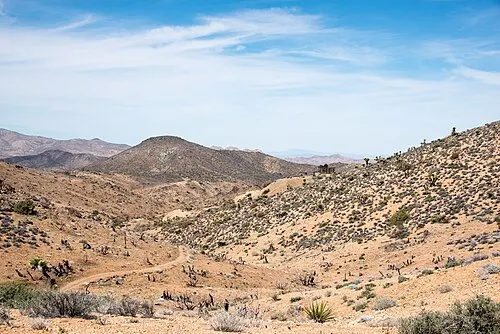 Preserved 1890s ten-stamp mill of the Lost Horse Mine standing in the high desert.