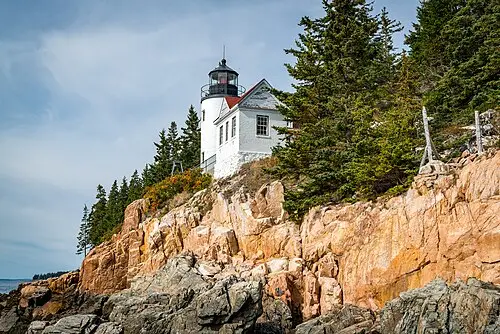 Granite ledges and surf along the Acadia coast near the Ocean Path between Sand Beach and Otter Cliff.