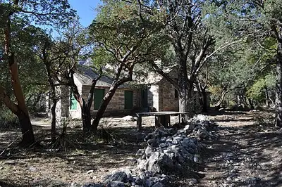 Wallace Pratt's 1932 stone cabin at the turnaround of the McKittrick Canyon trail.