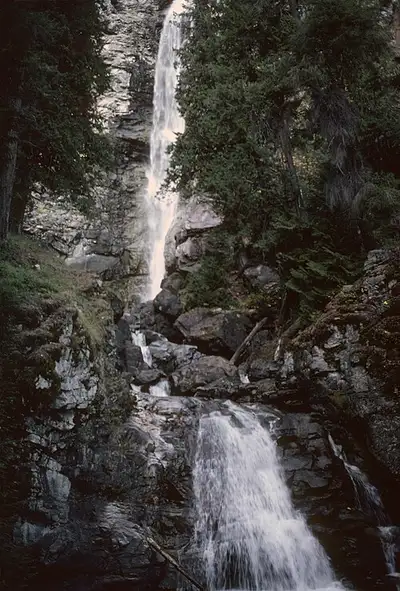 Rainbow Falls plunging down a cliff in the Stehekin valley of North Cascades National Park.