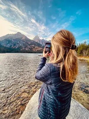 Taggart Lake at the end of the day-hike trail sitting directly under the Teton Range.