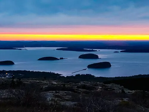 Sunrise from the Cadillac Mountain summit overlook over Frenchman Bay, the first U.S. sunrise from October to March, Acadia National Park.