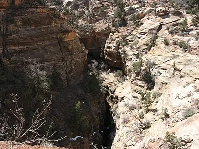 The view from the Canyon Overlook on the east side of Zion looking down toward the West Temple and the Towers of the Virgin.