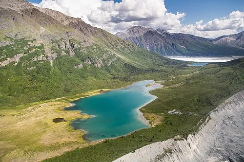 Donoho Basin above Kennicott, reached by crossing the Root Glacier, with the high Wrangell peaks behind.