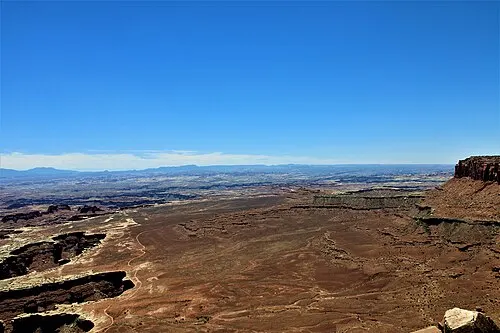 Railed Grand View Point overlook near the end of the Island in the Sky road, the most accessible big canyon view in the park.