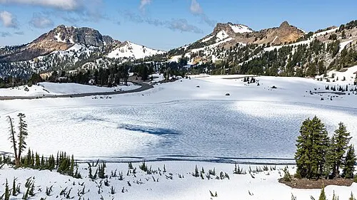 Lake Helen holding snow and ice into June at the high point of the Lassen Park Highway.