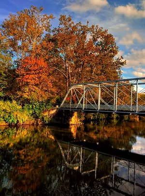 Autumn foliage reflected in still water at Cuyahoga Valley National Park near Akron, Ohio.