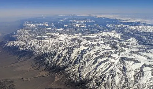 Aerial view of Mount Whitney and the southeastern Sierra Nevada crest at the eastern boundary of Sequoia National Park.