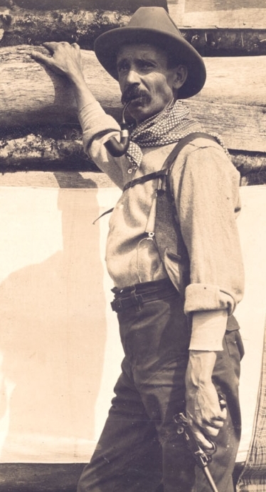Portrait of Horace Kephart in 1906, seated outdoors in a wool jacket