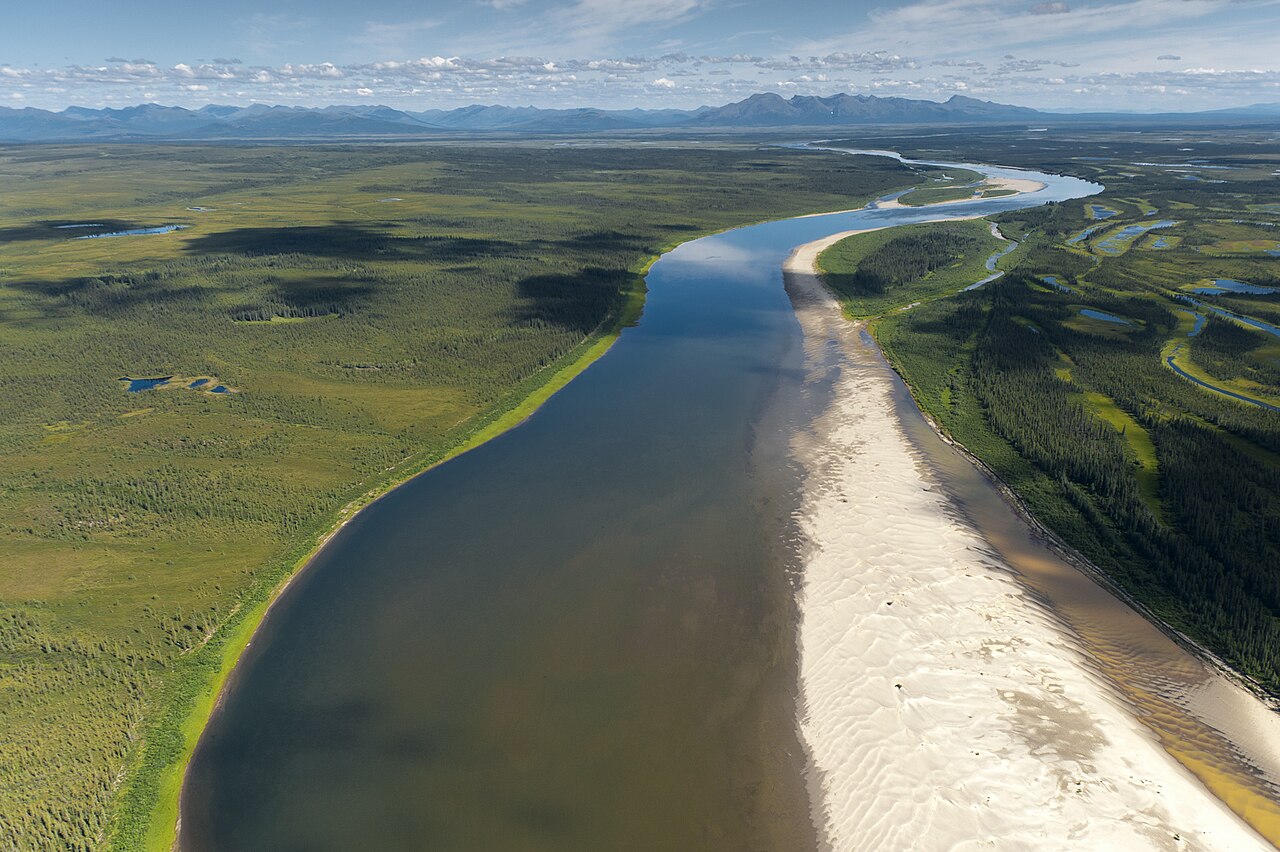 The Kobuk River winding through boreal forest and tundra, photographed from the air